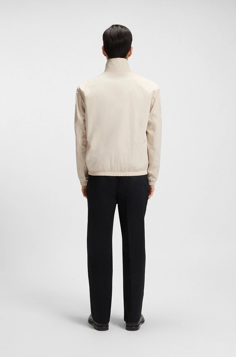Water-repellent reversible jacket with check pattern