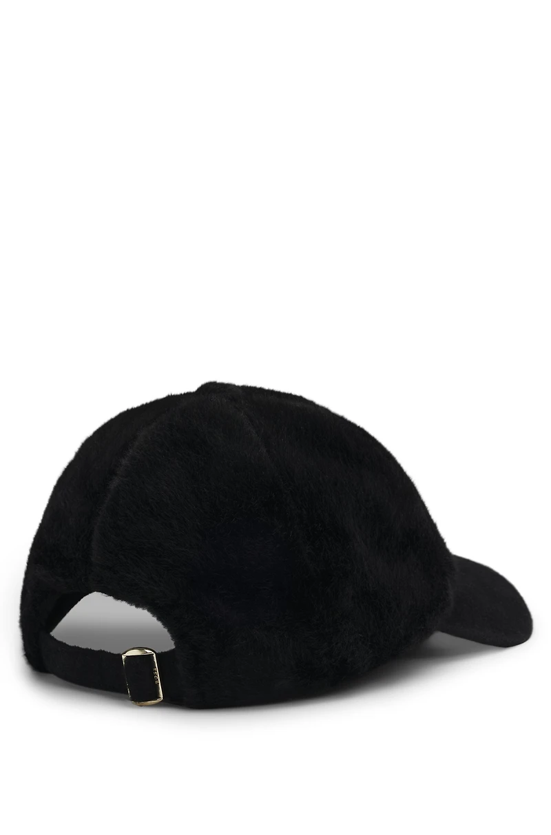 Faux-fur cap with wool-silk visor