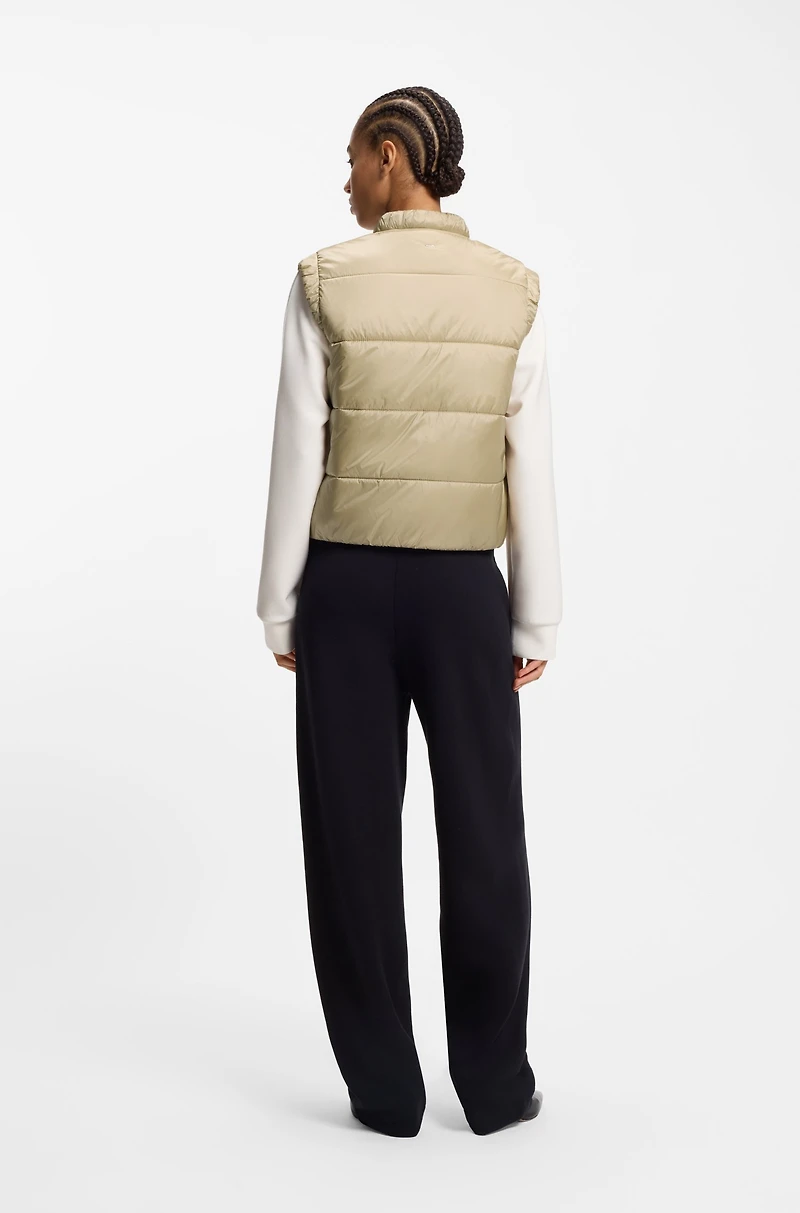 Water-repellent gilet with wadding