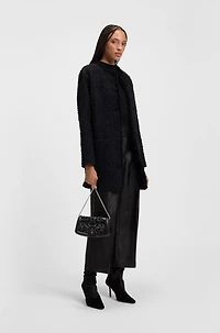 Ariell clutch bag with sequin embellishments