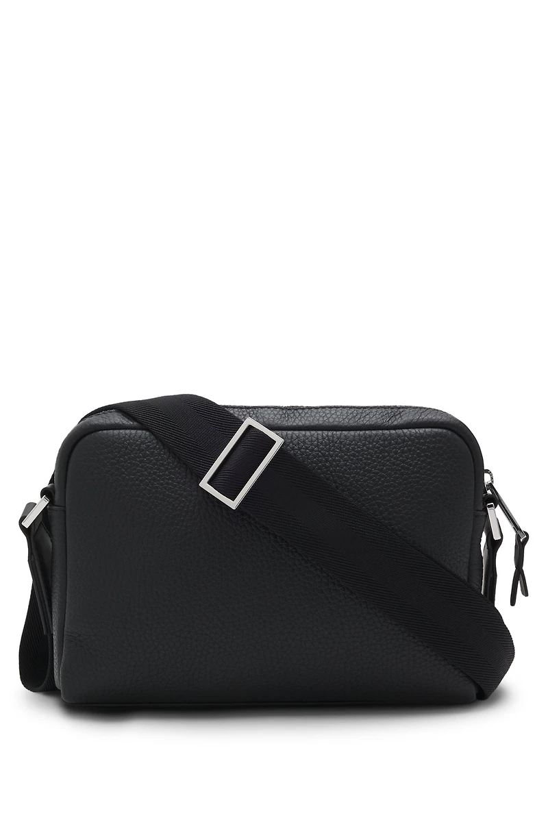 Reporter bag in textured and plain leather