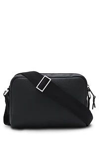 Reporter bag in textured and plain leather