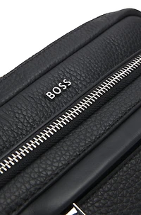 Reporter bag in textured and plain leather