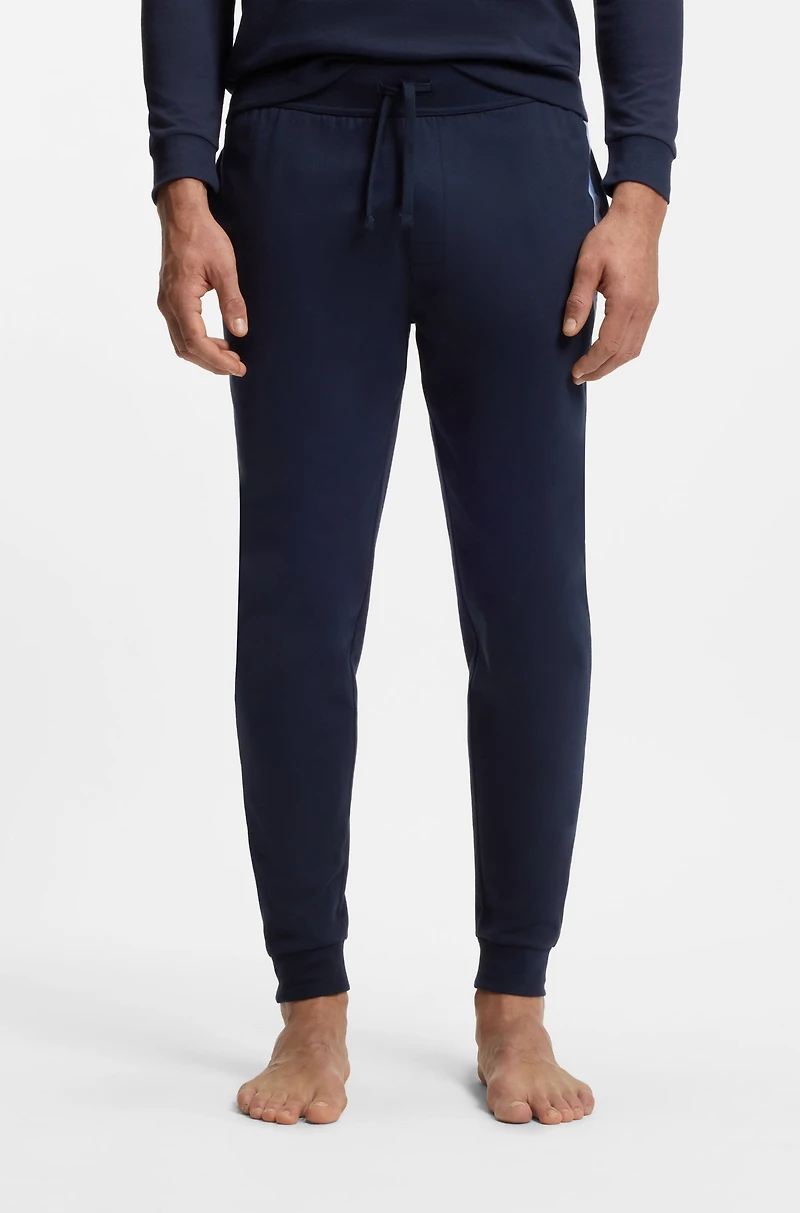 Cotton-terry tracksuit bottoms with logo and stripes