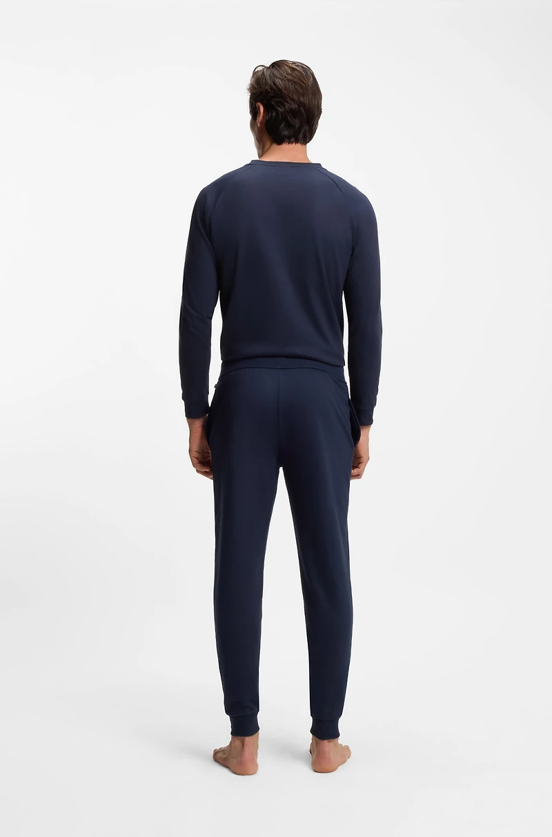 Cotton-terry tracksuit bottoms with logo and stripes