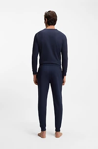 Cotton-terry tracksuit bottoms with logo and stripes