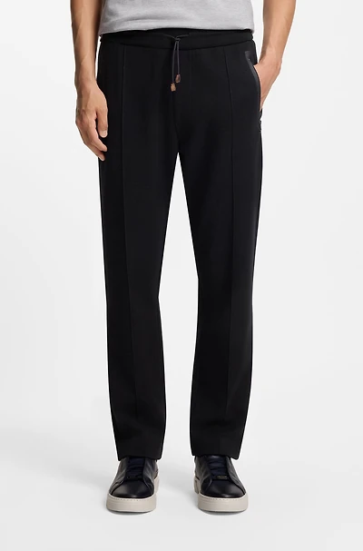 Cotton-blend tracksuit bottoms a regular fit