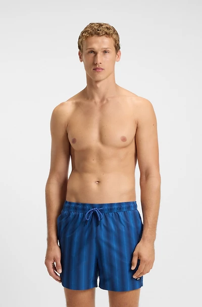Logo-badge swim shorts with stripe