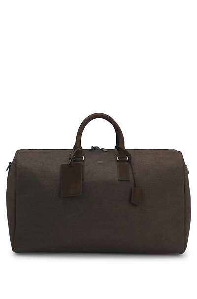 Fabric holdall with leather trims