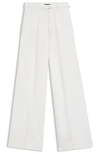 Wide-leg jeans with front pleats