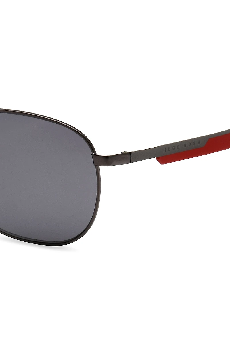 Sporty metal sunglasses with mixed-material temples