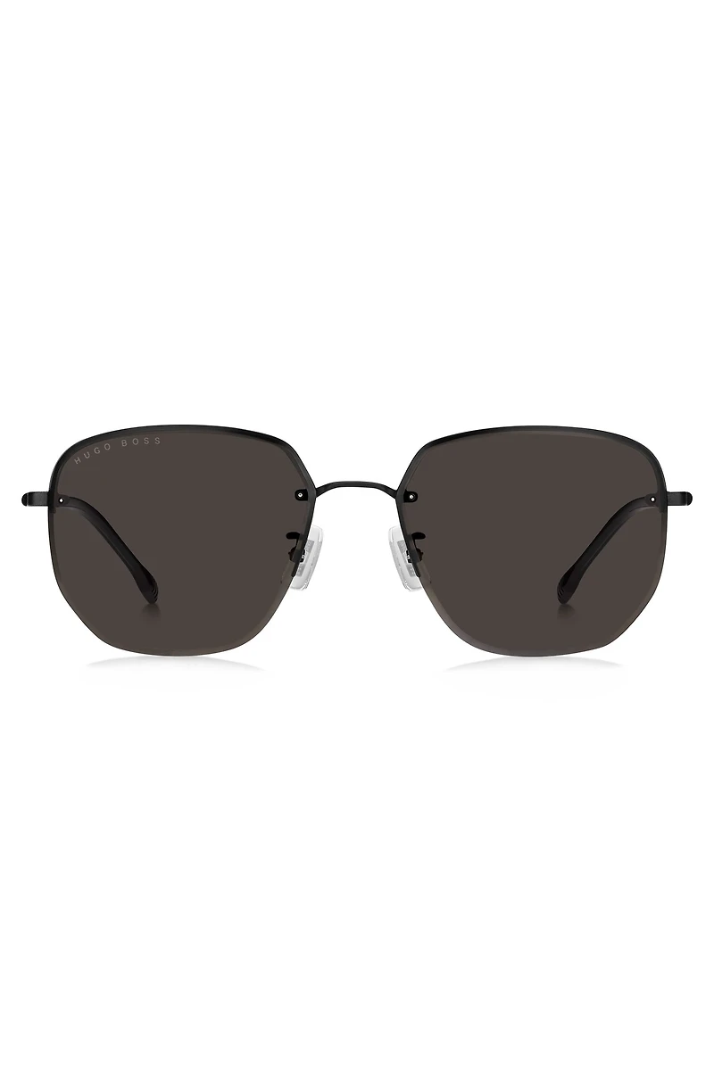 Half-rim sunglasses in black titanium and metal
