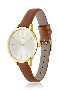 Gold-toned watch with crystal accents and leather strap