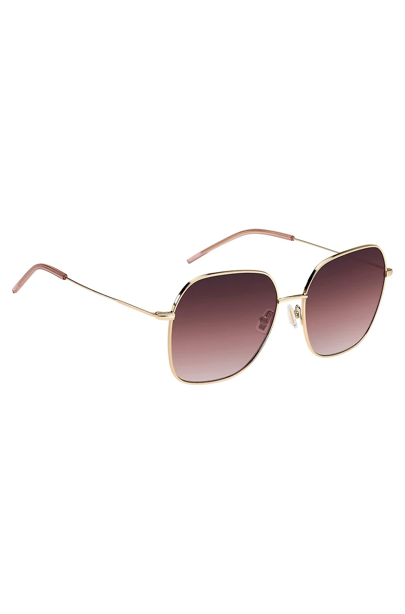 Gold-tone sunglasses with pink details