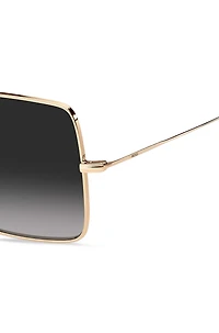 Gold-tone sunglasses with black end-tips