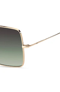Gold-tone sunglasses with green end-tips