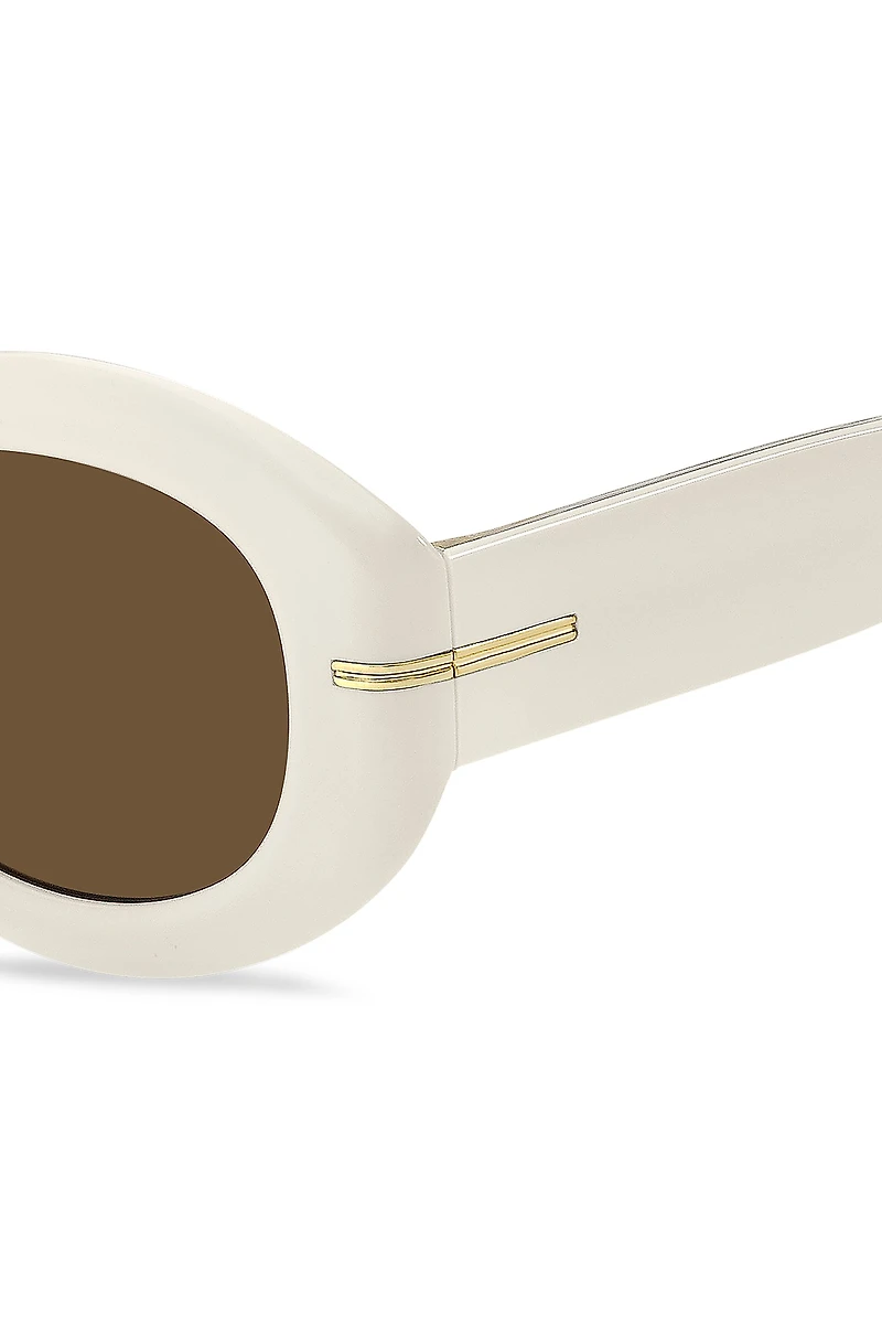 White-acetate sunglasses with signature gold-tone detail