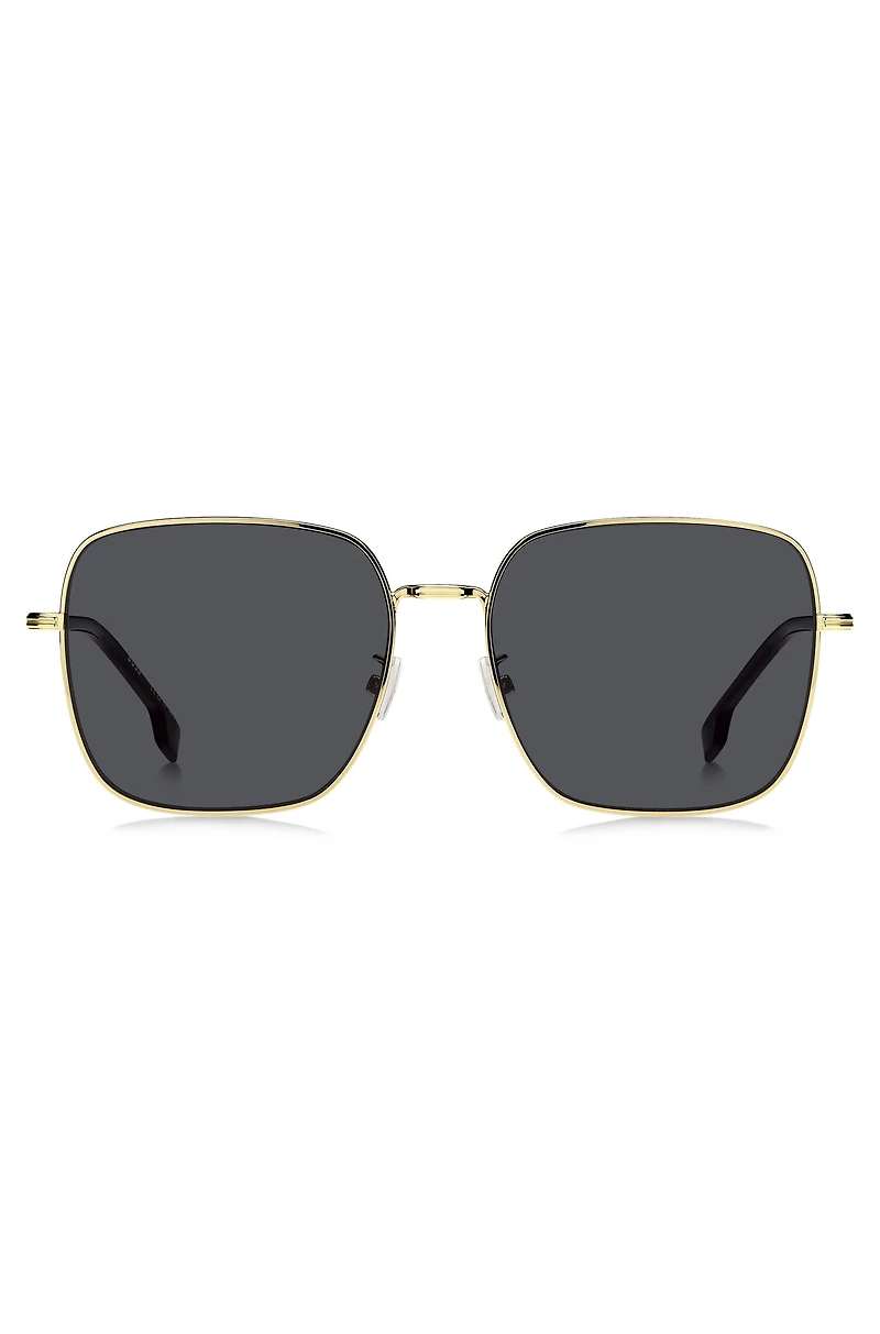 Gold-tone sunglasses with signature hardware