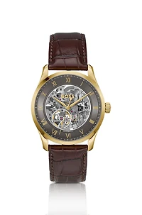 Gold-tone automatic watch with skeleton dial