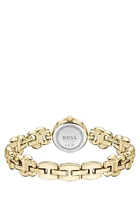 Gold-tone watch with monogram bracelet