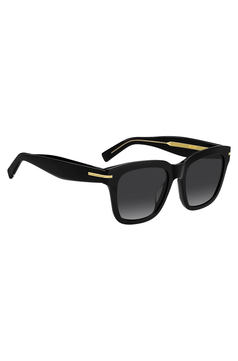 Black-acetate sunglasses with gold-tone details