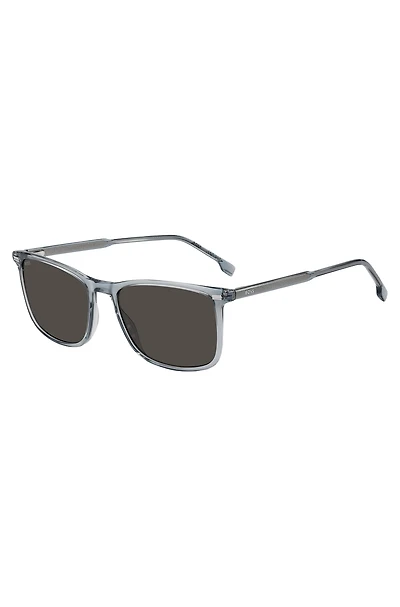 Transparent-blue sunglasses with temple logo
