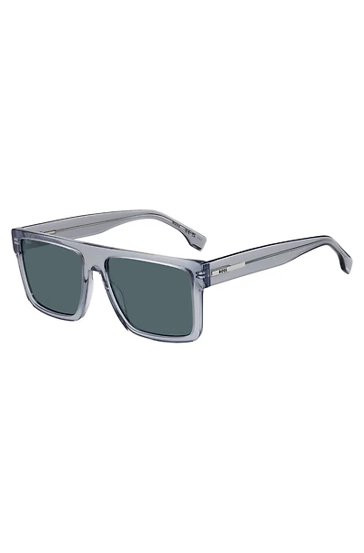 Transparent-blue sunglasses with logo plaque