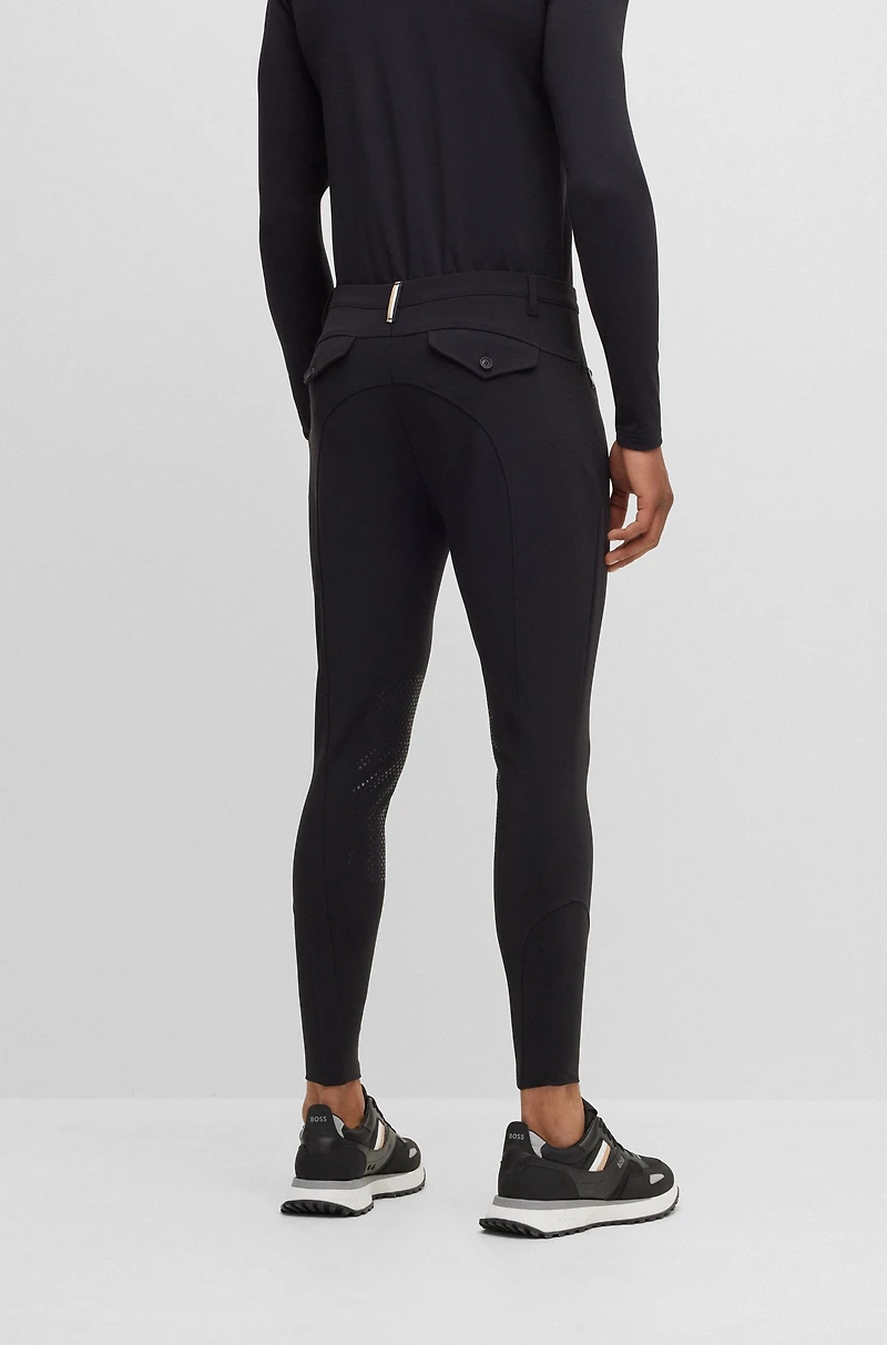 Equestrian knee-grip breeches power-stretch material