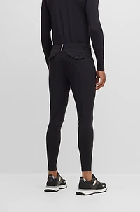 Equestrian knee-grip breeches power-stretch material