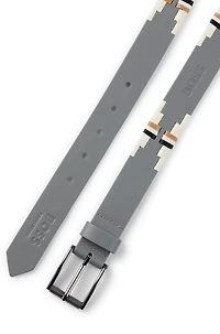 Equestrian polo belt with embroidered pattern