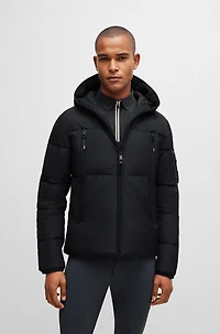 Equestrian hooded puffer jacket with fleece-lined pockets