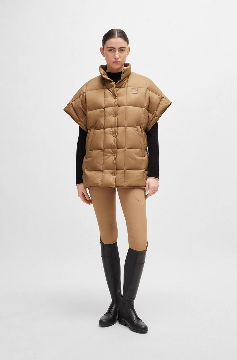 Equestrian down cape with fleece-lined pockets