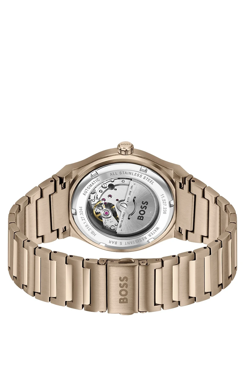 Gold-tone automatic watch with grooved dial