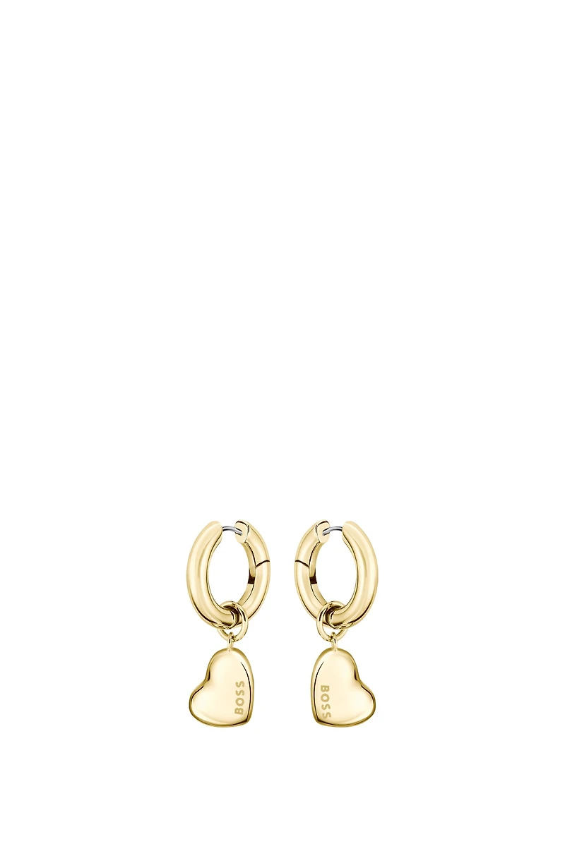 Gold-tone huggie hoop earrings with heart charms