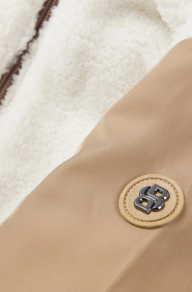 Baby tracksuit with red-panda logo badge