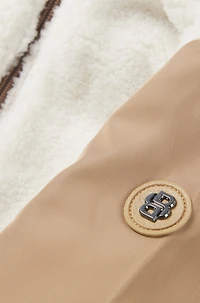 Baby tracksuit with red-panda logo badge