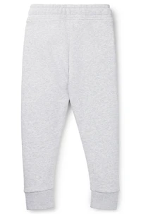 Kids' tracksuit bottoms with vertical logo print