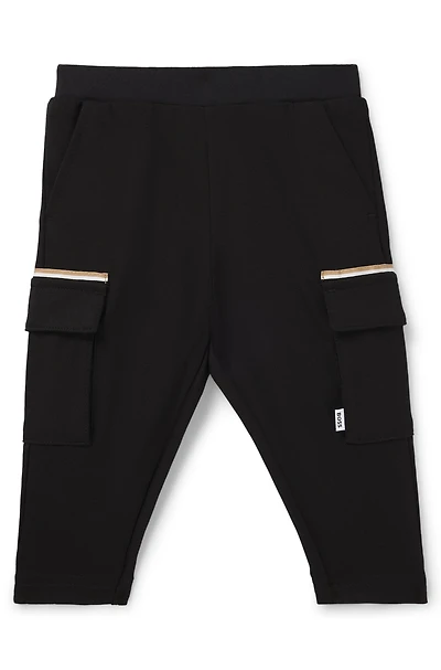 Kids' cargo trousers stretch piqué with logo label