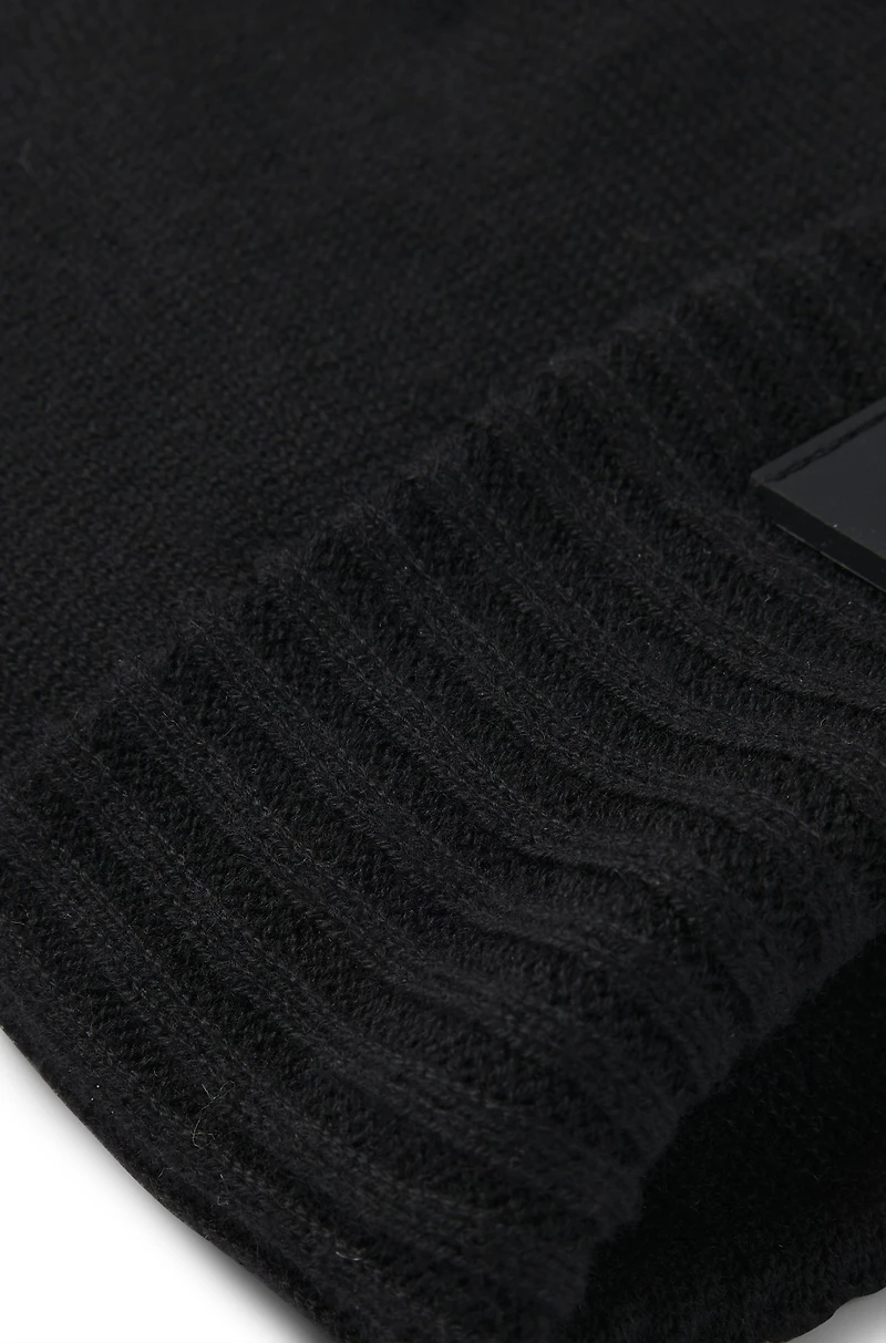 Kids' beanie hat with silicone logo label