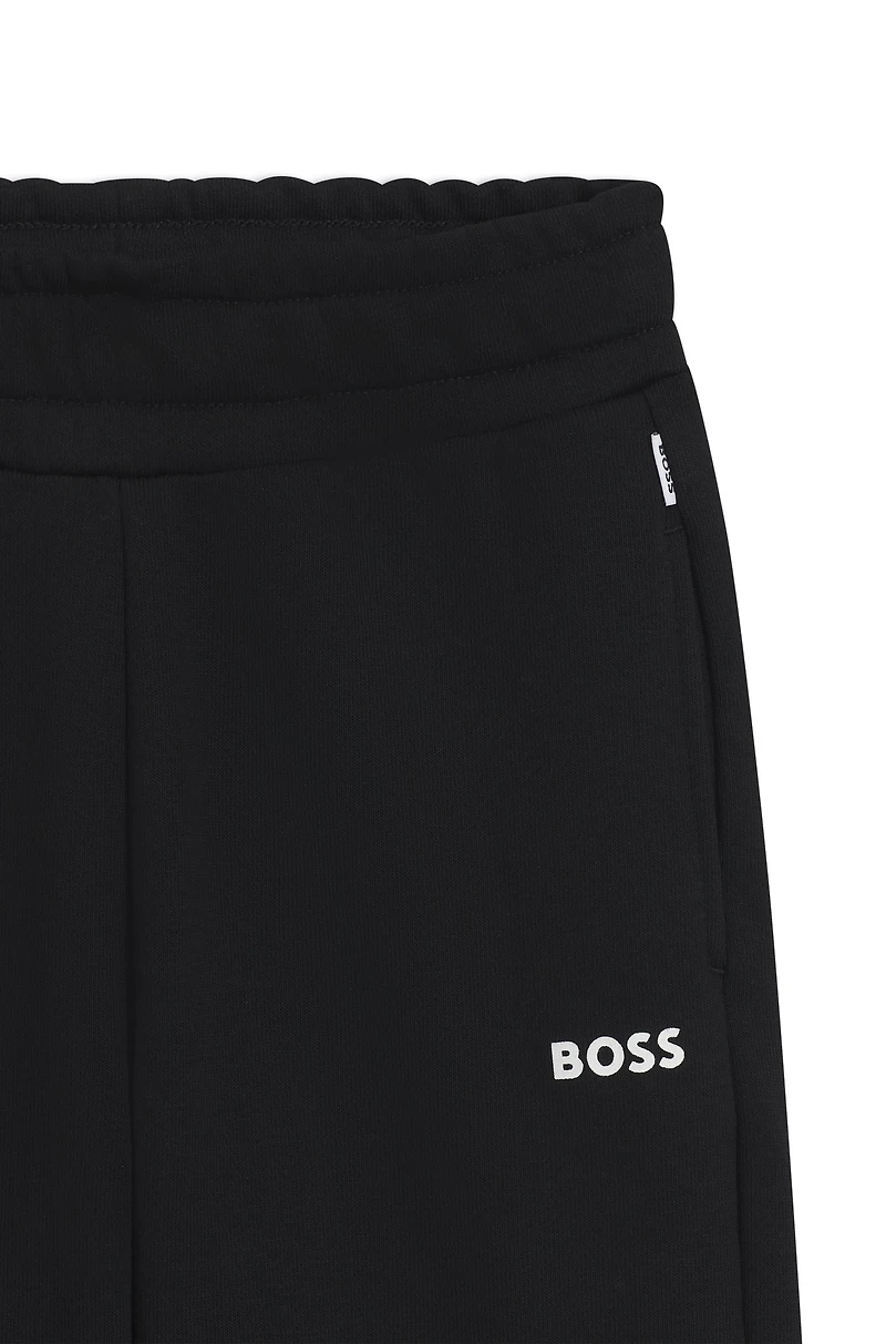 Kids' tracksuit bottoms with logo print