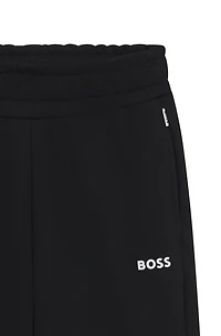 Kids' tracksuit bottoms with logo print