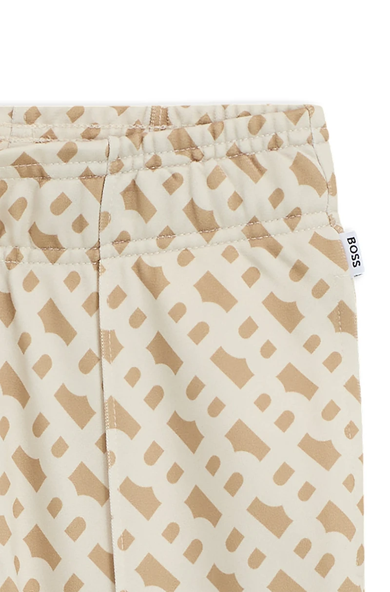 Kids' monogram-print tracksuit bottoms with zipped hems