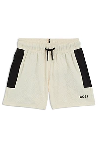 Kids' swim shorts seersucker fabric with logo print