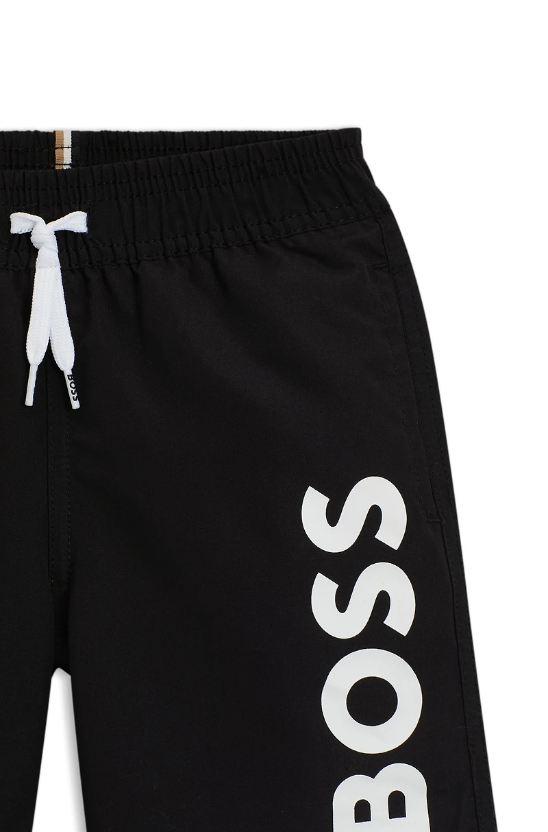 Kids' swim shorts peached fabric with logo print