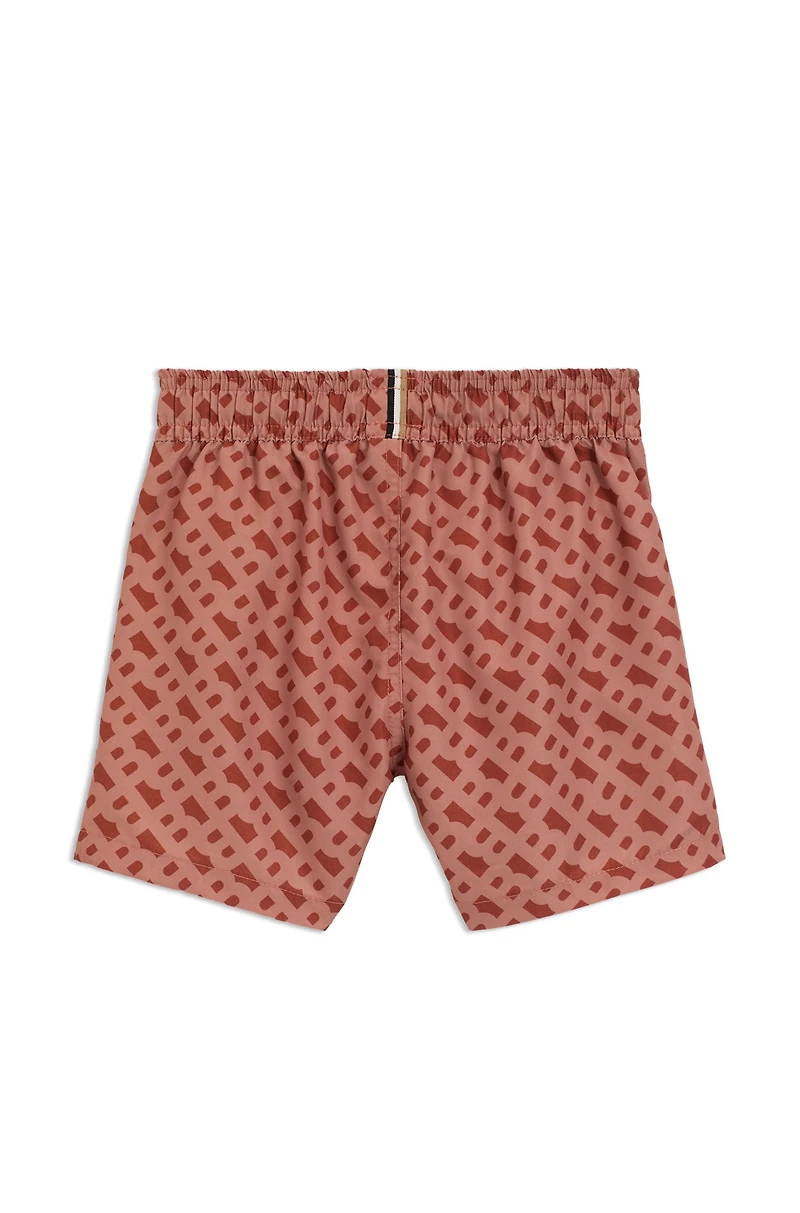 Kids' swim shorts with monogram print