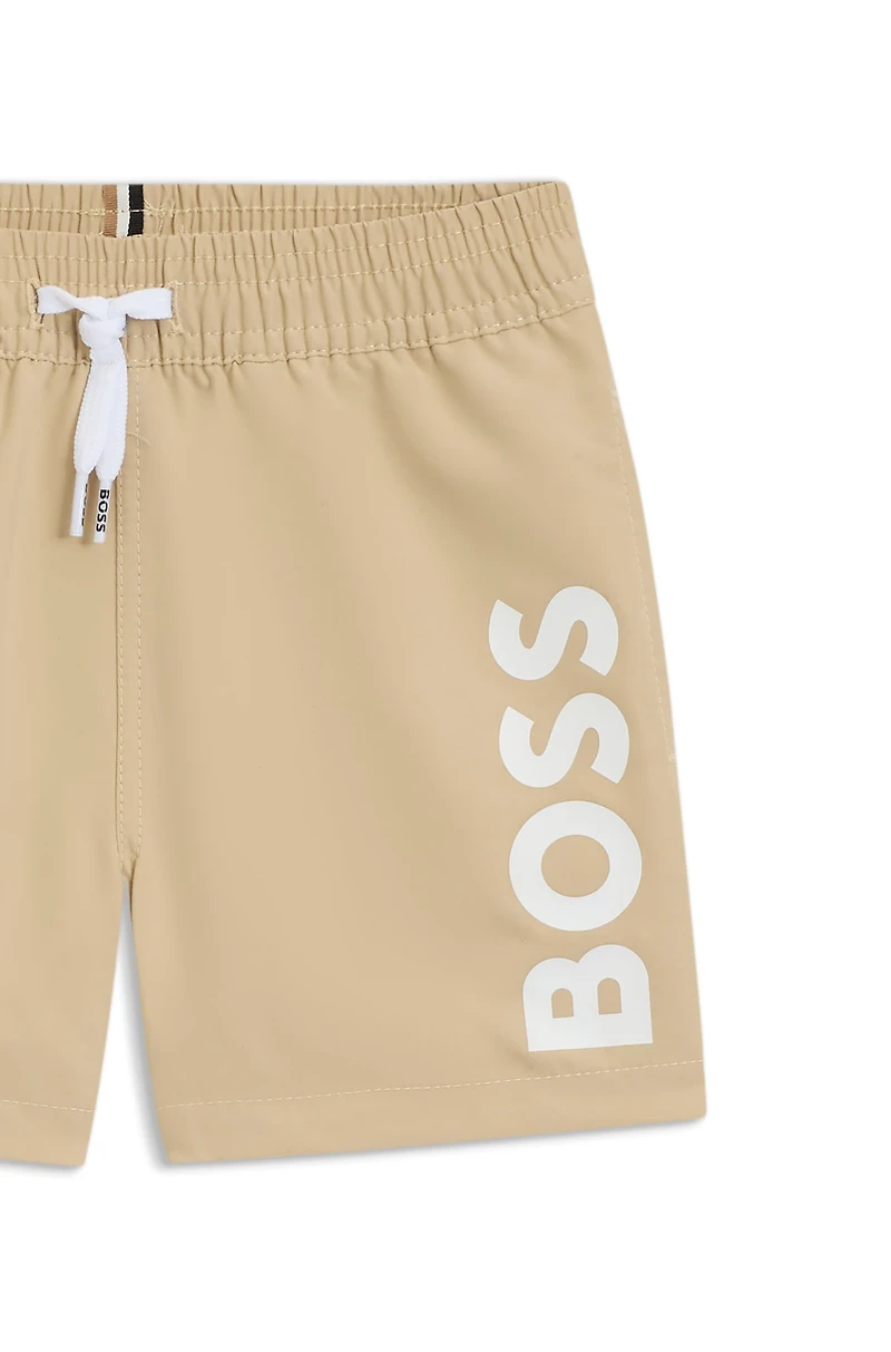 Kids' swim shorts peached fabric with logo print