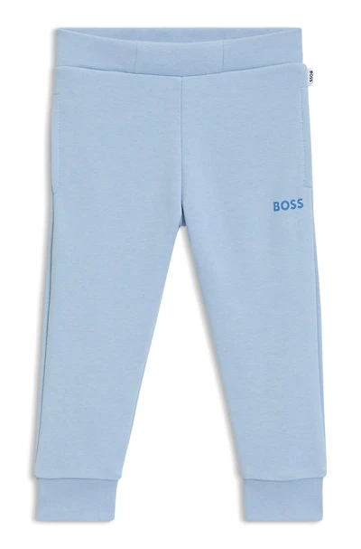 Kids' tracksuit bottoms with logo print