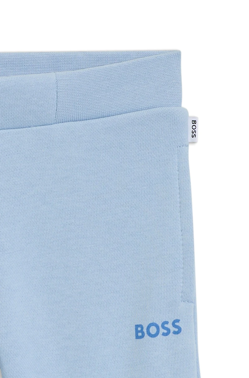 Kids' tracksuit bottoms with logo print