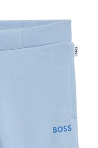 Kids' tracksuit bottoms with logo print