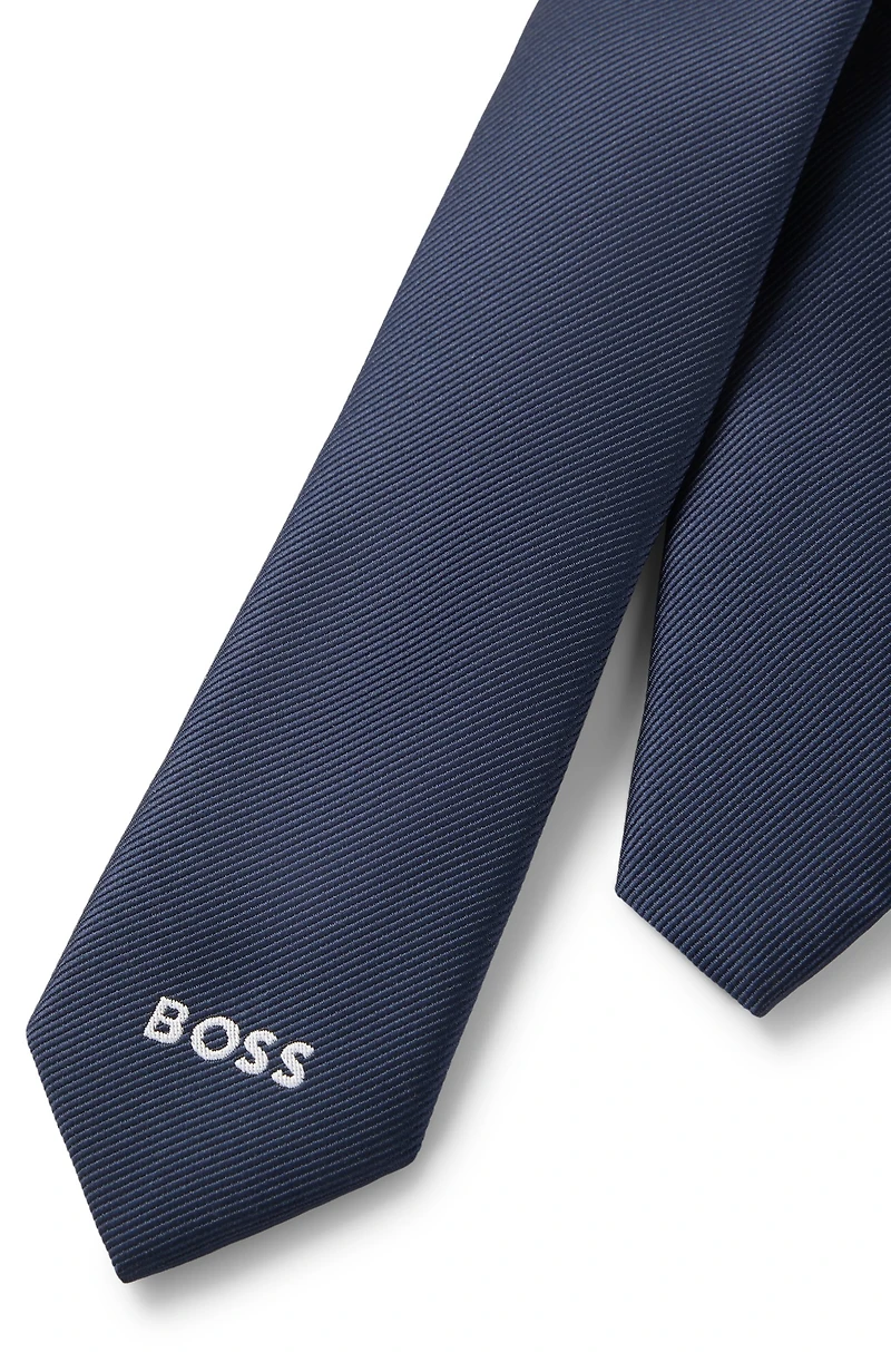 Kids' tie with adjustable fastening
